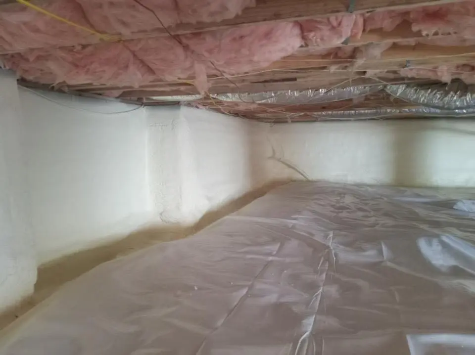 Crawl space encapsulation with closed-cell spray foam for Commercial Roof Restoration in North Valley